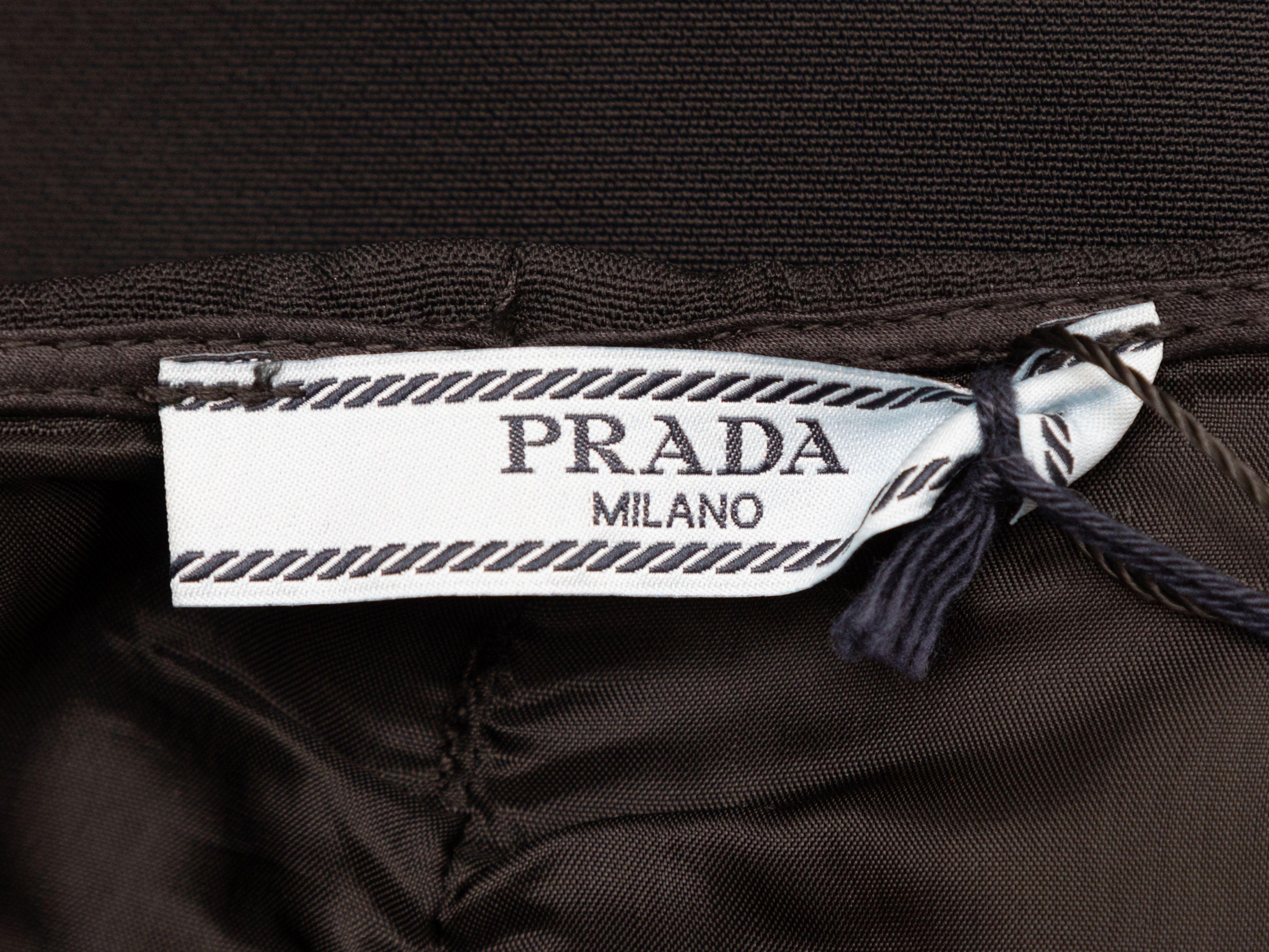 Product Details: Black silk-blend pencil skirt by Prada. Circa 2017. Zip closure at back. 29