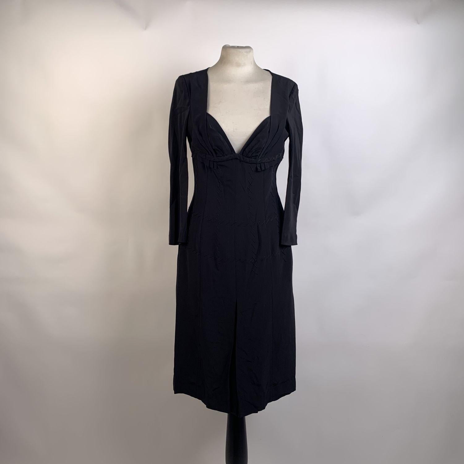 Prada long sleeves sheath dress, crafted in black silk with stitchings detailing. Sweetheart neckline. Rear zip closure. Lined. Composition: 100% Silk. Size: 42 IT (it should correspond to a SMALL size)



Details

MATERIAL: Silk

COLOR: