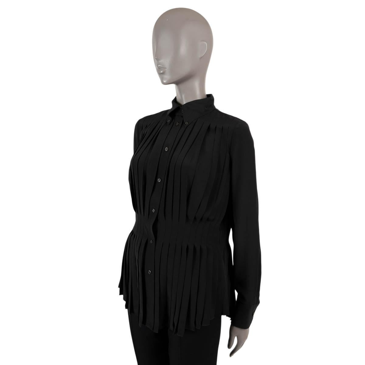 100% authentic Prada pleated blouse in black in silk (100%). Opens with buttons on the front. Unlined. Has been worn and is in excellent condition.

Measurements
Tag Size	40
Size	S
Shoulder Width	37cm (14.4in)
Bust From	104cm (40.6in)
Waist