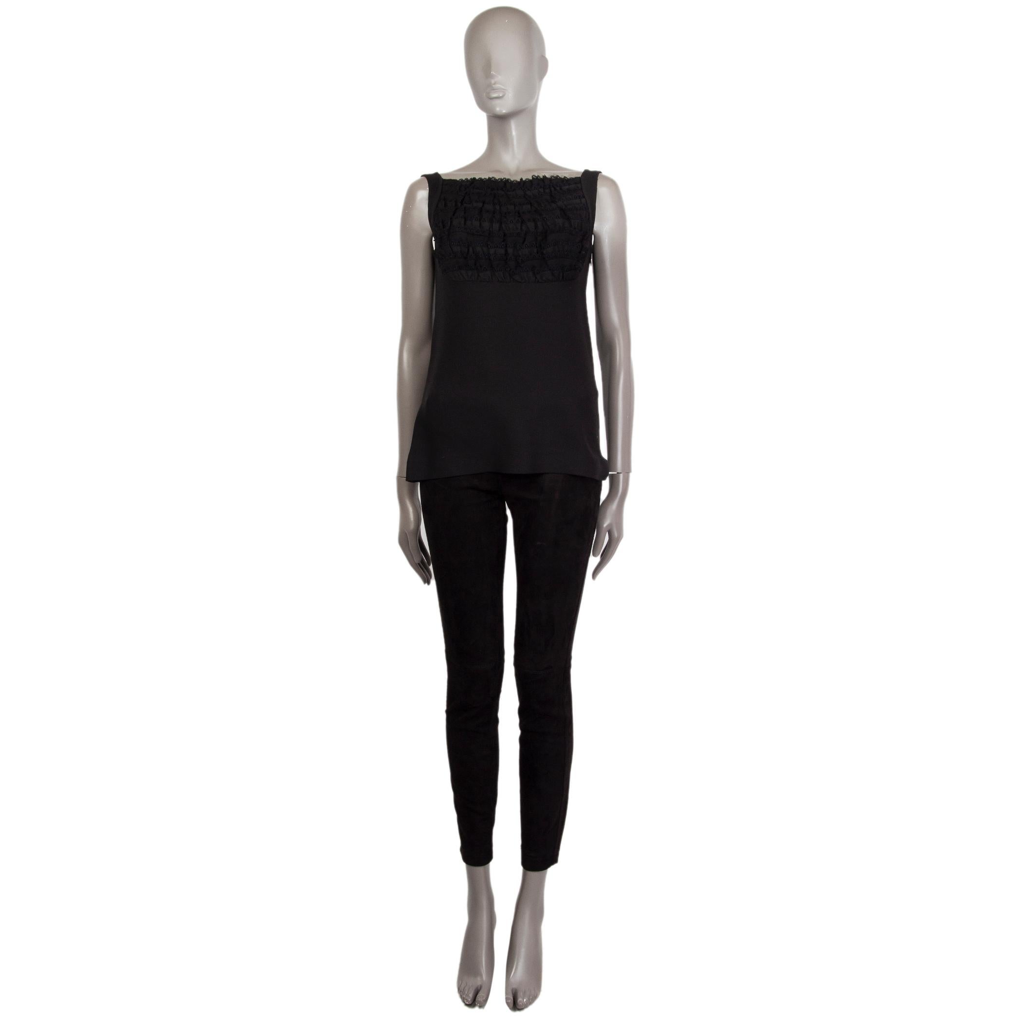 100% authentic Prada ruched-panel sleeveless top in black silk (100%). With square neck. Closes on the side with hock and invisable zipper. Unlined. Has been worn and is in excellent condition. 

Measurements
Tag Size	38
Size	XS
Shoulder Width	35cm