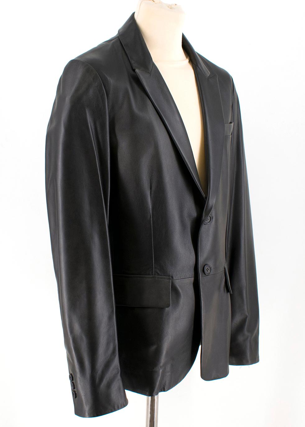 Prada black single-breasted 100% lamb skin blazer

- 2 front flapped pocket
- single-breasted buttons closure
- 2 inside pockets with buttons
- 100% viscose linings
- Leather brand label
- Made in Italy

Please note, these items are pre-owned and