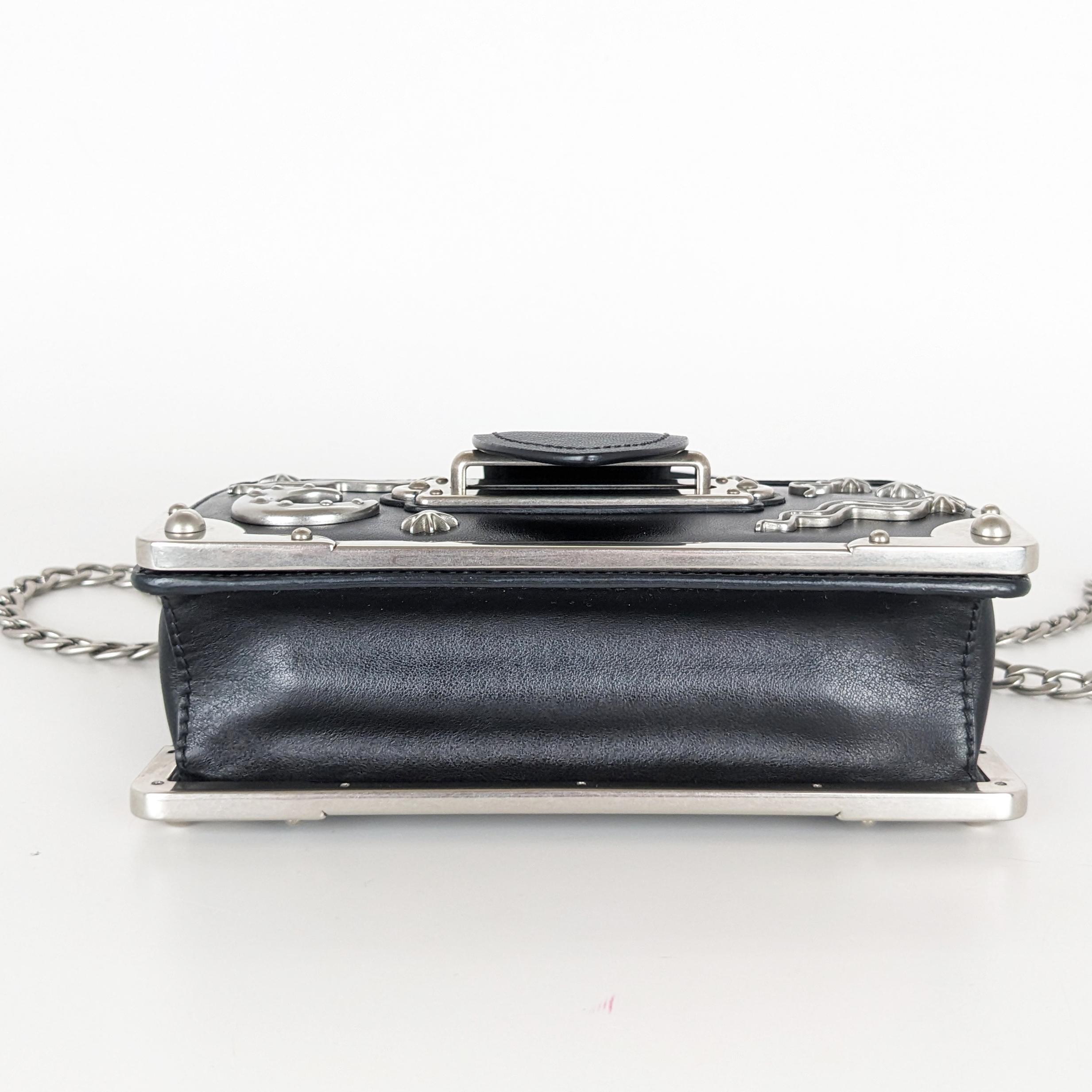 black crossbody bag with silver hardware