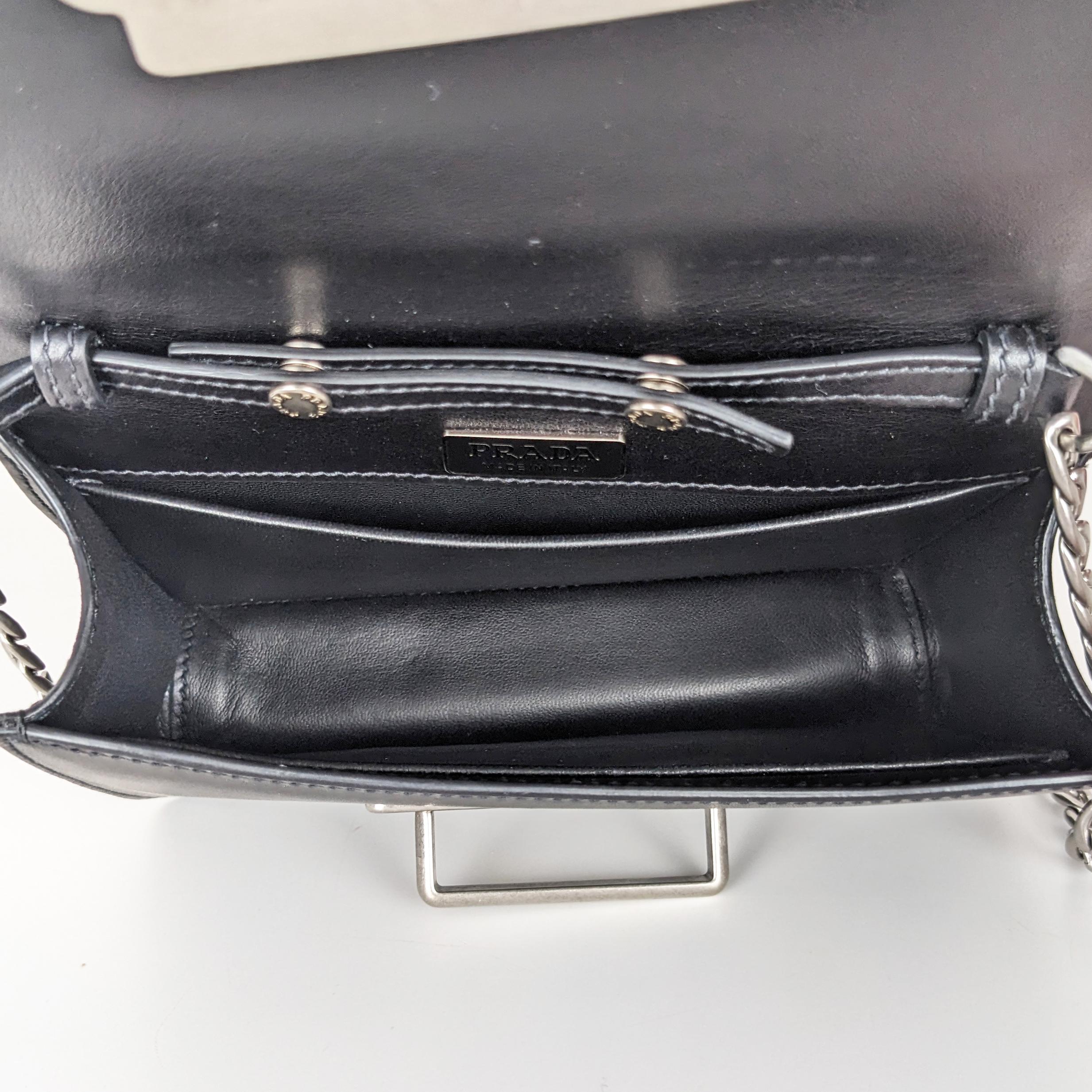 Prada Black Small Astrology Cahier Silver Hardware Leather Crossbody Bag In Excellent Condition In Denver, CO