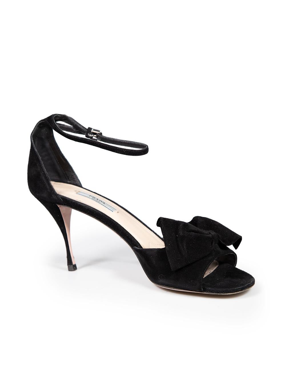 CONDITION is Good. Minor wear to sandals is evident. Light abrasion and scratches to rear, heel and tip of both shoes on this used Prada designer resale item.
 
 
 
 Details
 
 
 Black
 
 Suede
 
 Sandals
 
 Mid heel
 
 Open toe
 
 Bow detail
 
