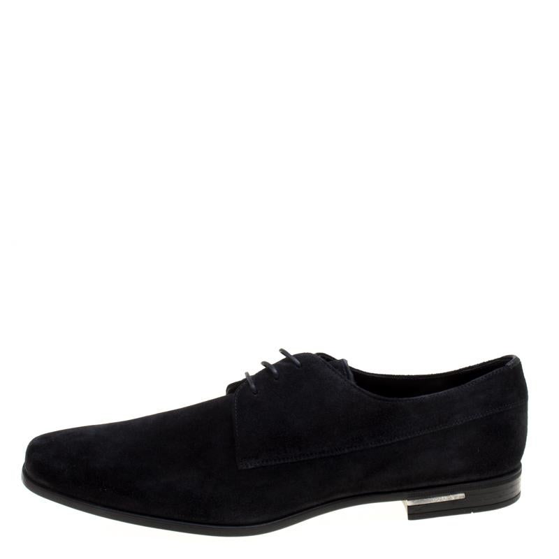 Walk in style and charm onlookers in these fabulous derby shoes from Prada. They are made of suede and feature square toes and lace-ups on the vamps. They come equipped with comfortable leather lined insoles and tough rubber soles. Pair them with a