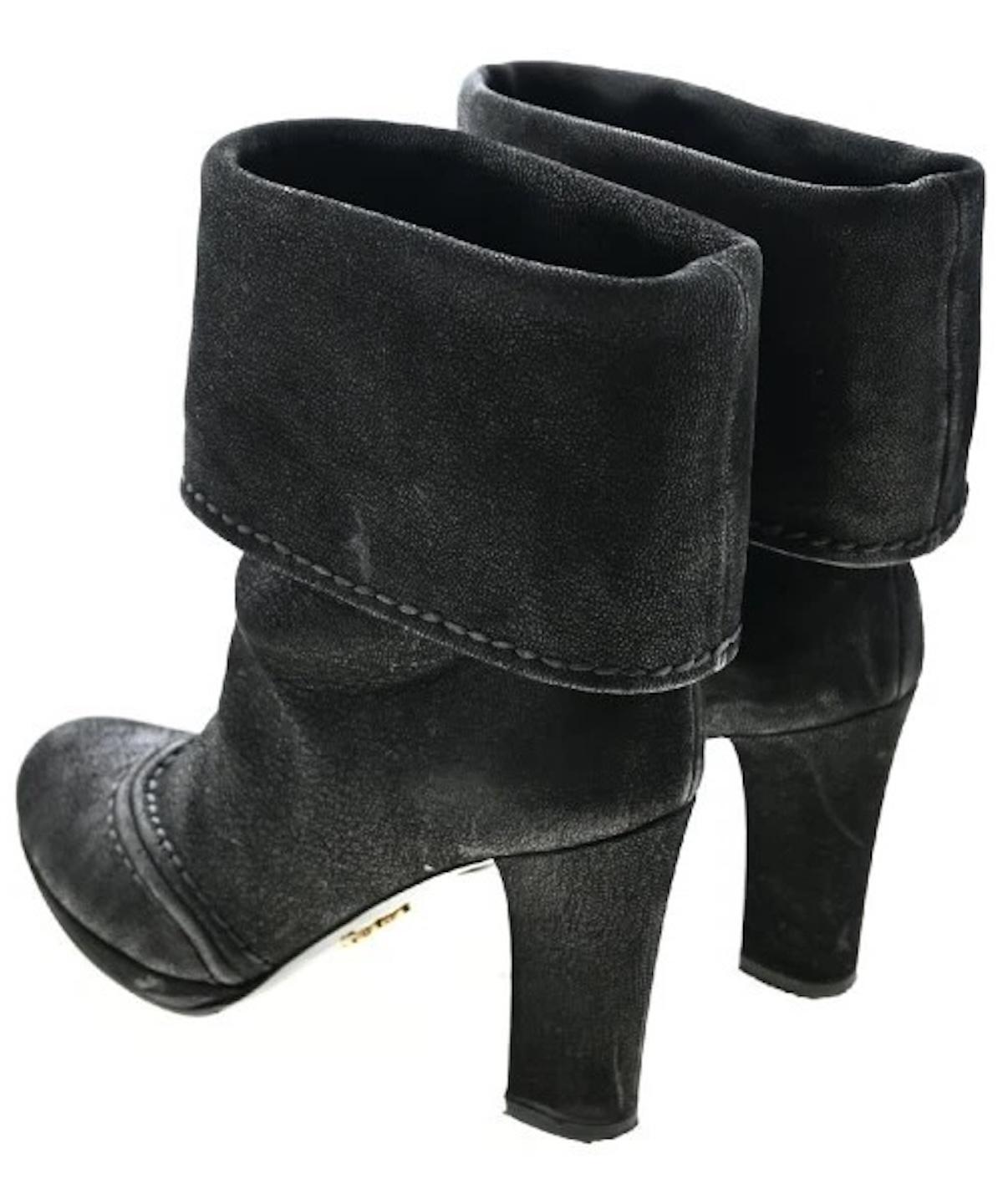 Prada fold-over ankle boots women. made in Italy
Prada Black Suede Leather Boots Size EU 36.
They can be worn folded or tall.
Prada Boots in black suede, lapel on the upper, rounded toe, tone-on-tone stitching. 
Black nubuck Prada boots made in