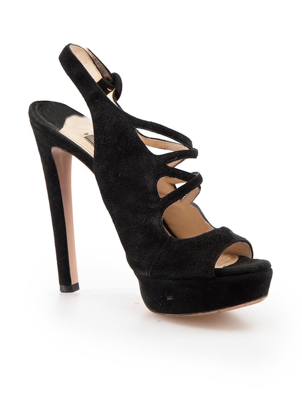 CONDITION is Very good. Minimal wear to shoes is evident. Minimal wear to both sides and heels of both shoes with abrasions to the suede on this used Prada designer resale item.
 
Details
Black
Suede
Heeled sandals
Peep toe
Adjustable slingback