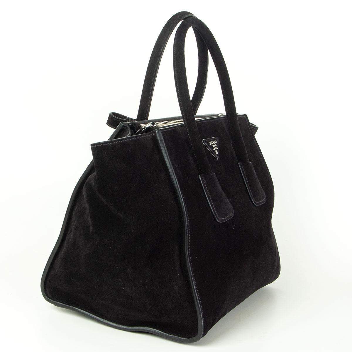 Prada 'Twin Pocket' tote in black Scamosciato (suede) featuring silver-tone hardware. Opens with a push-button and is lined in smooth black lambskin with two extra large zip pockets on the side, a small zip pocket against the back and a open pocket