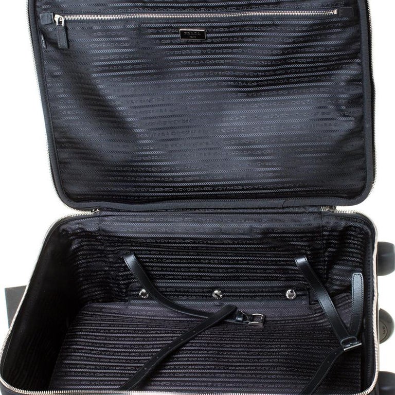 black rolling suitcase