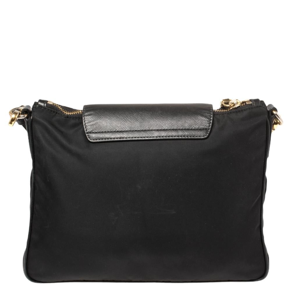 Carry this Prada handbag and step out like a modern-day fashionista. Flaunt this durable black nylon bag and rock that sophisticated look. With interiors done in nylon, this bag is skillfully crafted. A practical and polished everyday bag in a