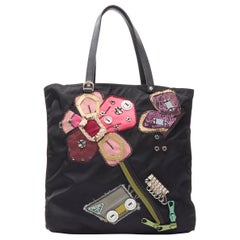 PRADA black Tessuto nylon floral patchwork bolts knit embellished tote bag