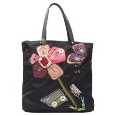 PRADA black Tessuto nylon floral patchwork bolts knit embellished tote bag