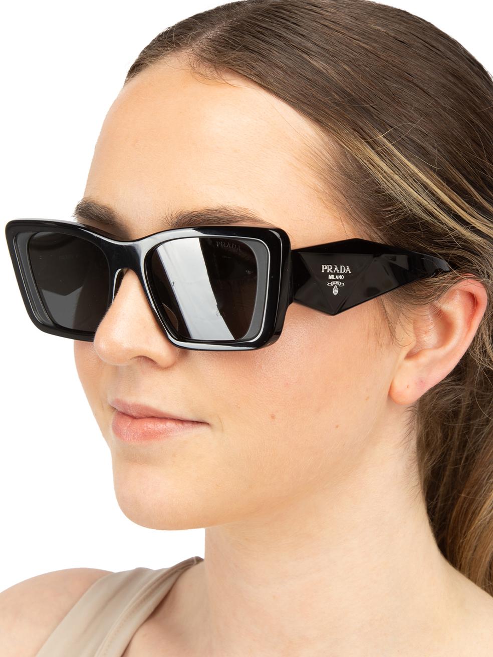 CONDITION is New with tags. No visible wear to sunglasses is evident on this new Prada designer resale item. This item comes with original packaging.
 

 
 Details
 
 
 Model: 0PR 08YS
 
 Black
 
 Acetate
 
 Butterfly sunglasses
 
 Dark grey tinted