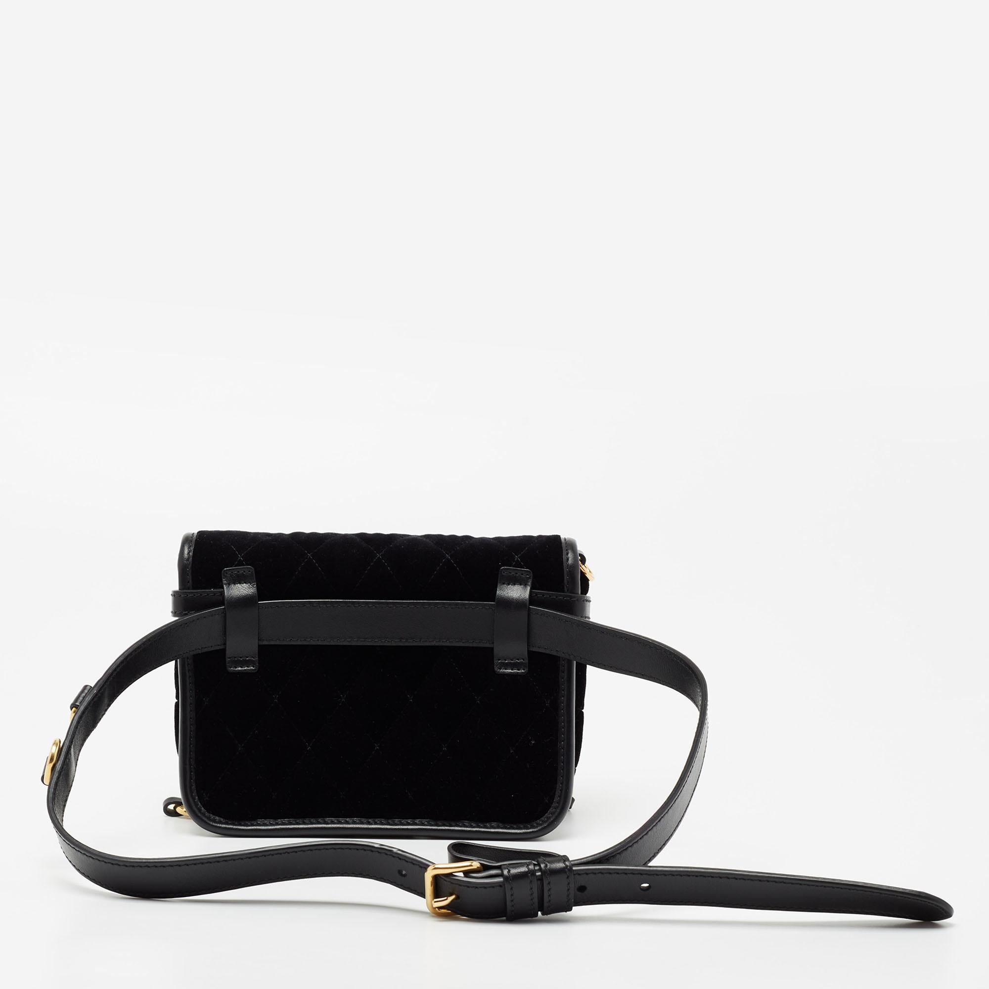 This Prada velvet & leather belt bag for women highlights convenient style in the best way. The bag has gold-tone ring details, a front brand logo, an adjustable belt strap, and an additional gold-tone chain.

Includes: Detachable chain, Belt Strap