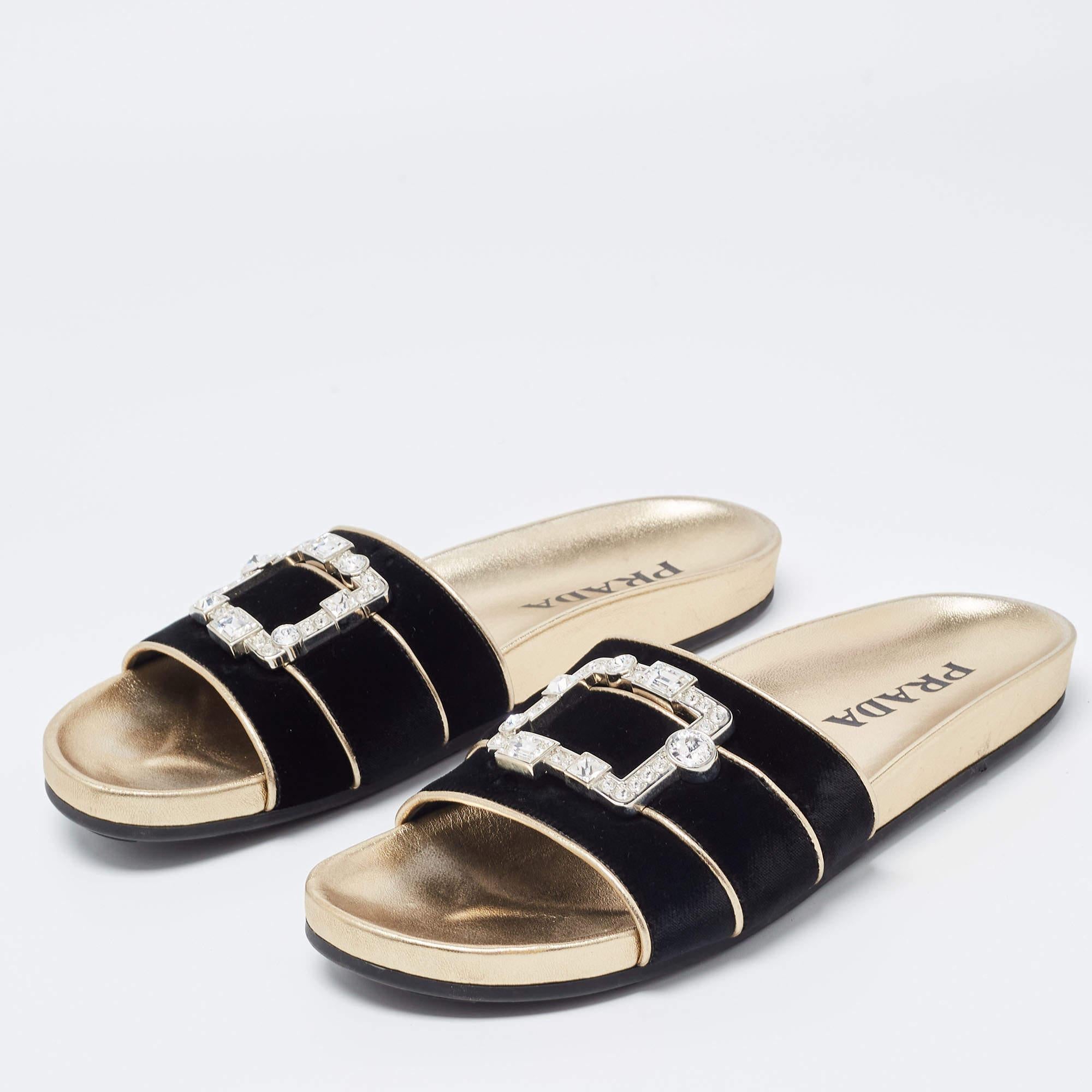 Enhance your casual looks with a touch of high style with these designer Prada slides. Rendered in quality material with a lovely hue adorning its expanse, this pair is a must-have!

