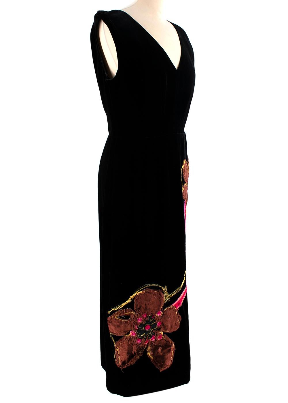 Prada Black Velvet Midi Dress With Applique Flower

- V-neckline 
- Black invisible zipper
- Vent at the back 
- sleeveless  

Material: 
81% viscose, 18% silk, 1% polyamide

Made in Italy 

PLEASE NOTE, THESE ITEMS ARE PRE-OWNED AND MAY SHOW SIGNS