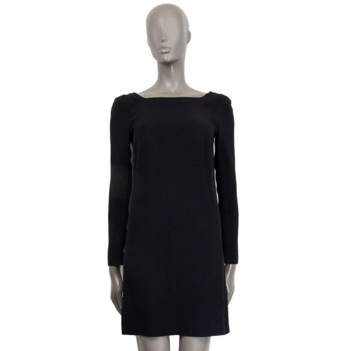 authentic Prada long-sleeve dress in black acetate (74%) and viscose (26%) with a deep back neckline. Opens with a zipper on the back and has a hidden zipper on the cuff. Has been worn and is in excellent condition. 

Tag Size 38
Size XS
Shoulder