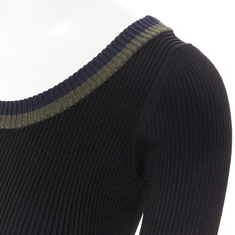 PRADA black viscose ribbed knit scoop neck web rimmed short sleeve top IT40 S 
Reference: LNKO/A01268 
Brand: Prada 
Designer: Miuccia Prada 
Material: Viscose 
Color: White 
Pattern: Solid 
Made in: Italy 

CONDITION: 
Condition: Very good, this