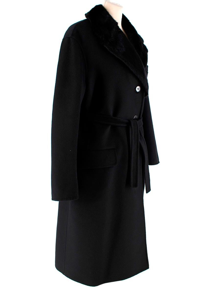 Prada Black Wool Cashmere & Angora Blend Mink Fur Collar Coat

-Made of an extra soft wool  cashmere and angora blend 
-Luxurious mink fur collar 
-Classic single breasted cut
-Pockets to the front 
-Button fastening to the front 
-Belt to the waist