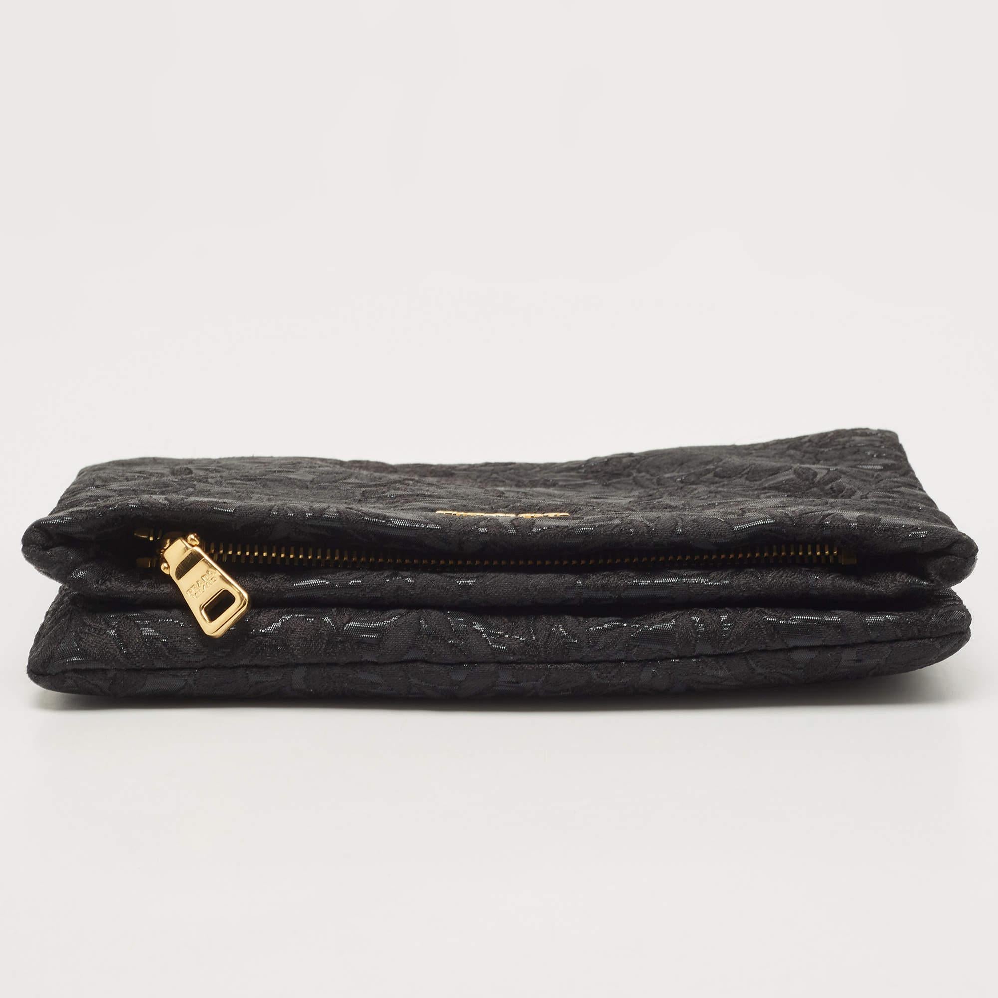 This Prada black clutch for women has the kind of design that ensures high appeal, whether held in your hand or tucked under your arm. It is a meticulously-crafted piece bound to last a long time.

Includes
Original Dustbag