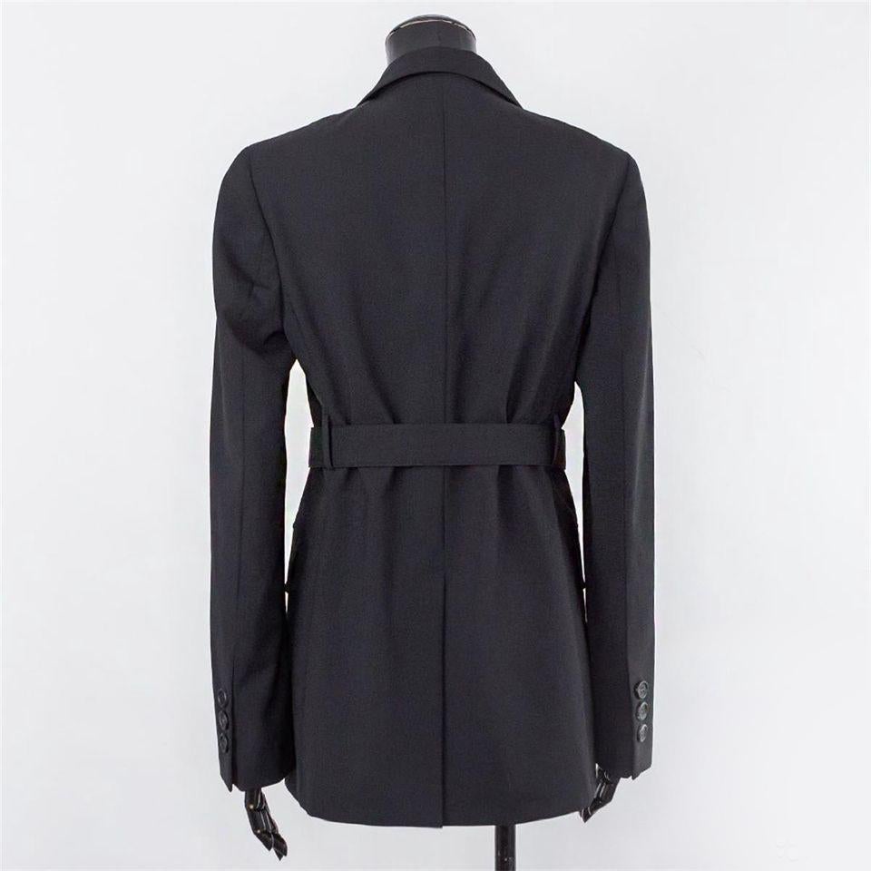 PRADA

Black Jacket

V- neck

Long sleeves
 
Black belt 


 Content: Wool 


Size 38 or US 2 (XS)


Pre-owned. Excellent condition!

 100% authentic guarantee 

       PLEASE VISIT OUR STORE FOR MORE GREAT ITEMS 