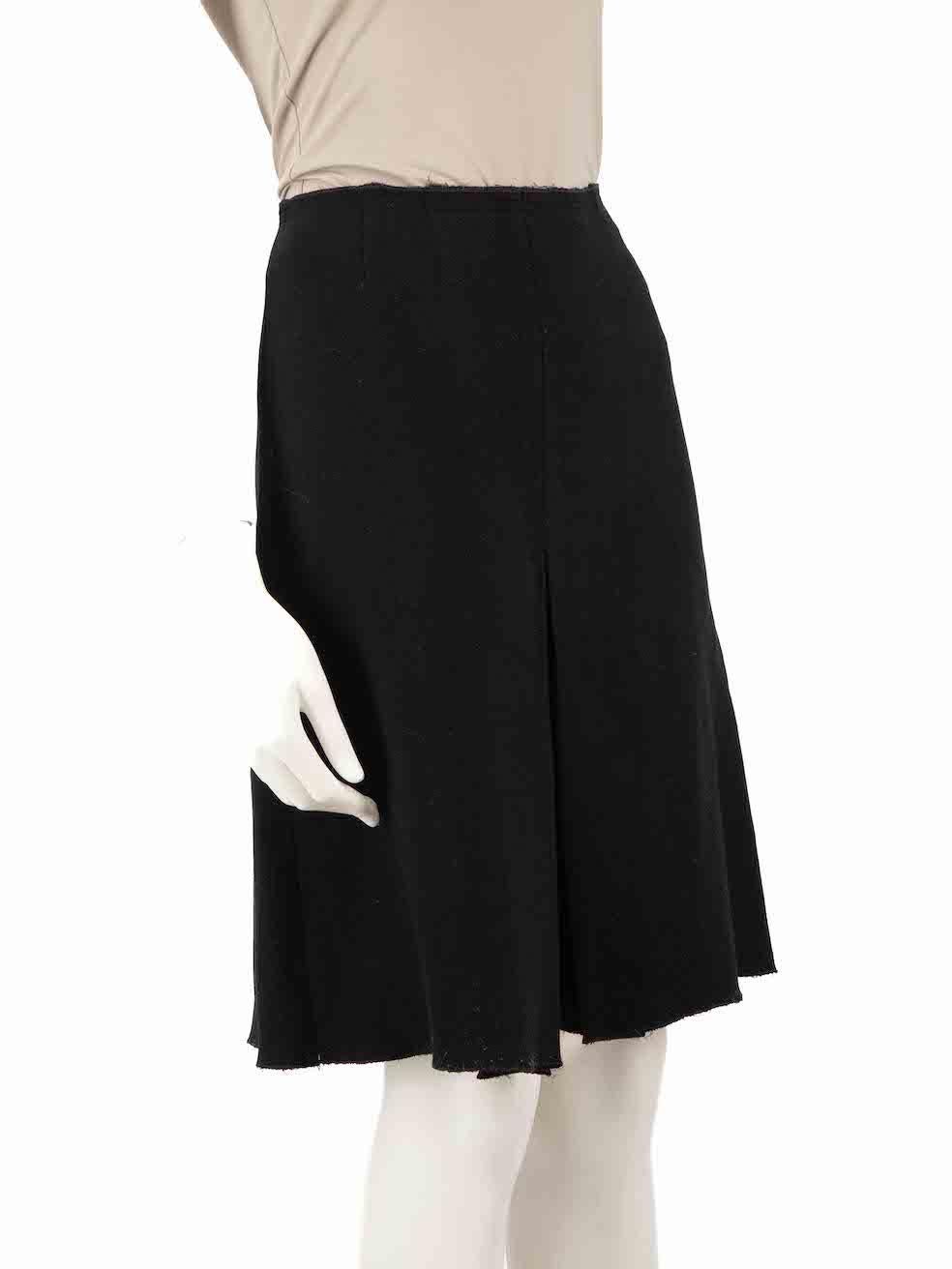 CONDITION is Good. Minor wear to skirt is evident. Light signs of wear to the front and back where the elasticated threads are visible. There is a small pull the weave on the front and loose threads on the top open seam on this used Prada designer