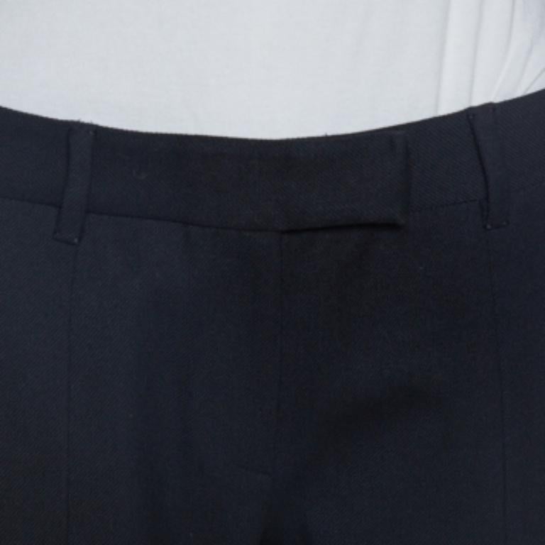 These trousers from Prada is a creation that you cannot let go of. They have been crafted from a wool blend and features a black shade all over. These trousers are styled with a tapered leg and zip fastening. They are great for casual occasions and