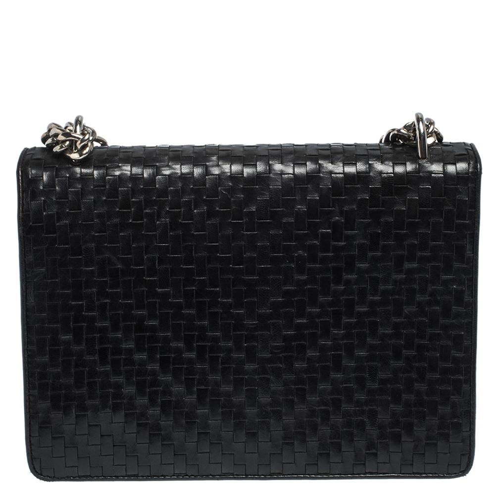 You'll love carrying this Madras bag by Prada. Made from black woven leather, this bag features a silver-tone chain-link and leather shoulder strap and a flap with brand detailed push-lock closure. The interior is lined with leather with a slip