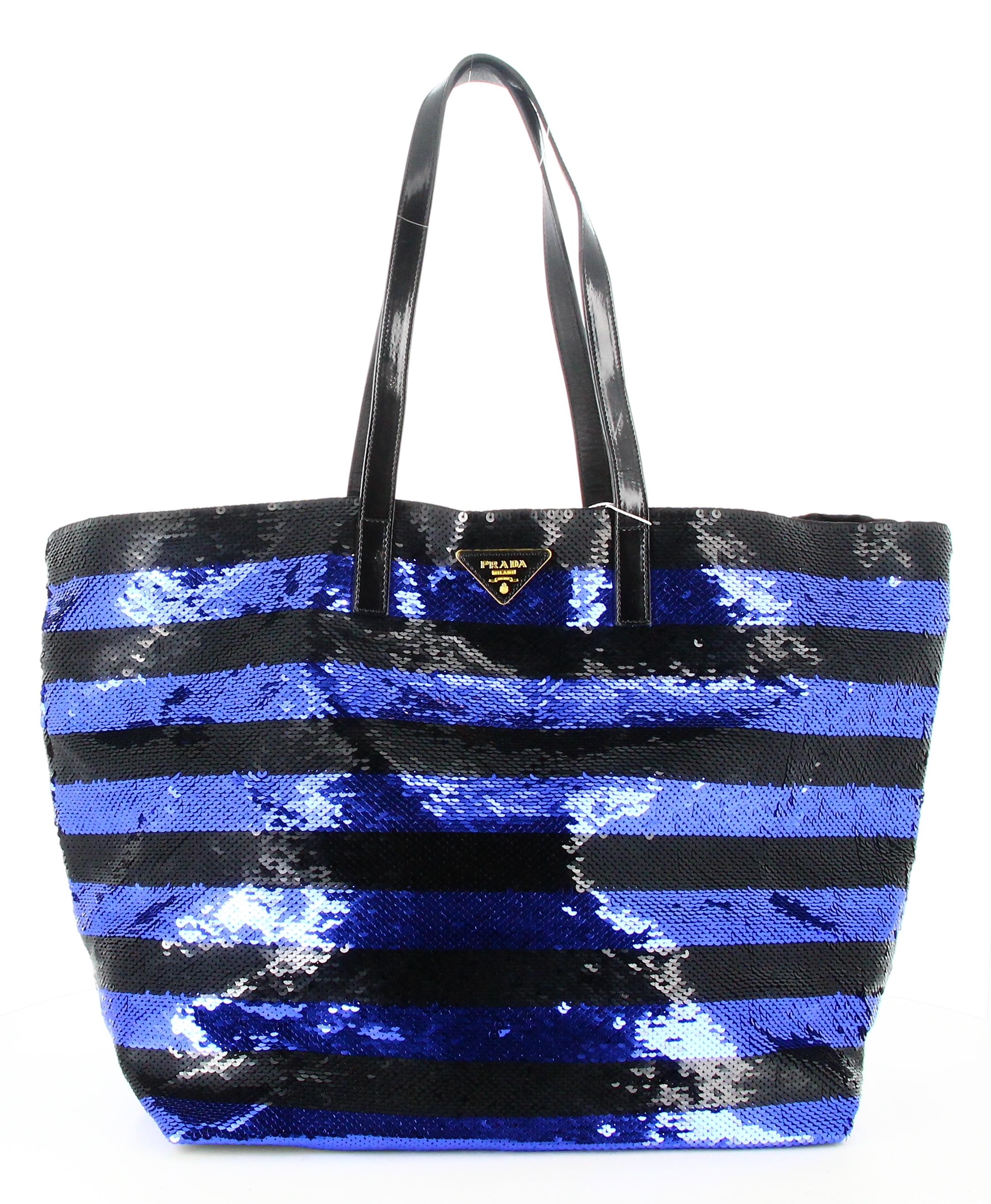 Prada Blue And Black Tote Shiny Strass Stripe 

- Very good condition. No signs of wear over time. 
- Prada tote bag
- Shiny rhinestone
- Blue and black stripe 
- Two black varnish straps
- Interior: black satin plus inside pocket
