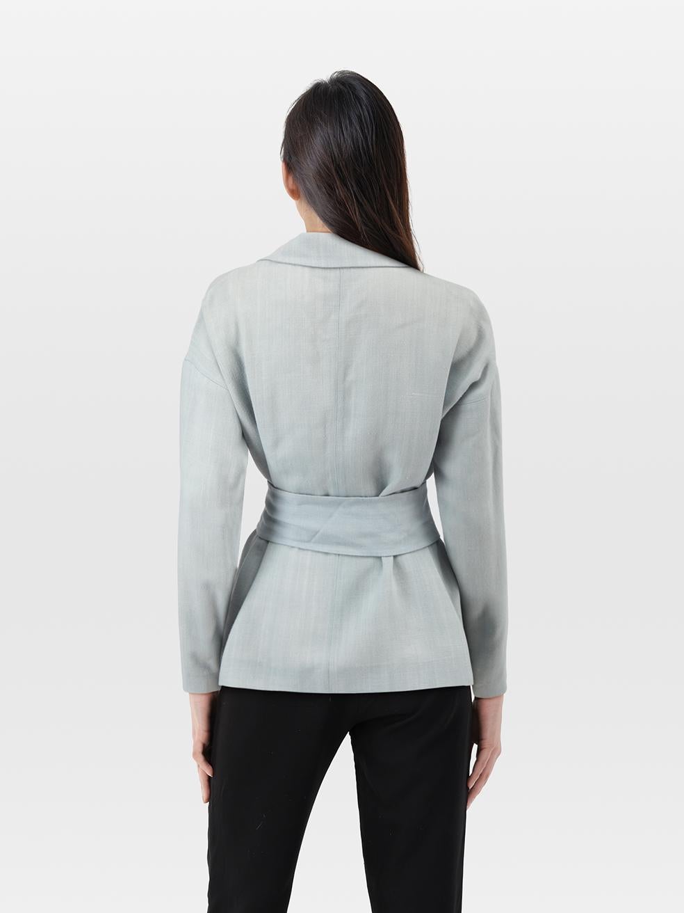 CONDITION is Very good. Minimal wear to blazer is evident. Minimal wear to the top centre front button where the button is partially detached due to loose thread. There is a small mark on the front right and peeling to overall fabric. Discolouration