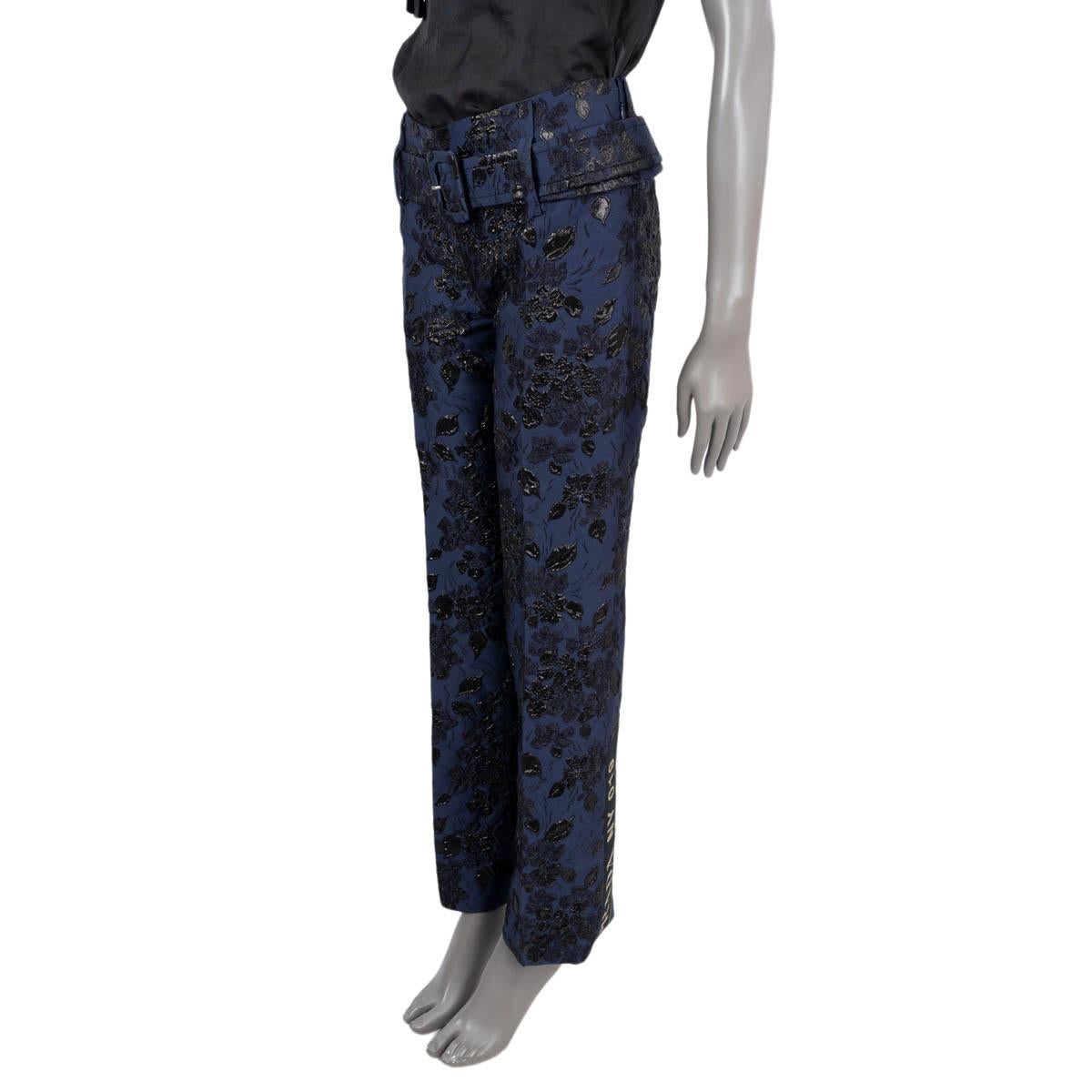 100% authentic Prada floral-cloqué wide-leg pants in navy blue and metallic black polyester (59%), acetate  (25%), silk (10%) and polyamide (6%). Features belted and brocade, on the side Prada lettering. Closes with a concealed zipper. Have been