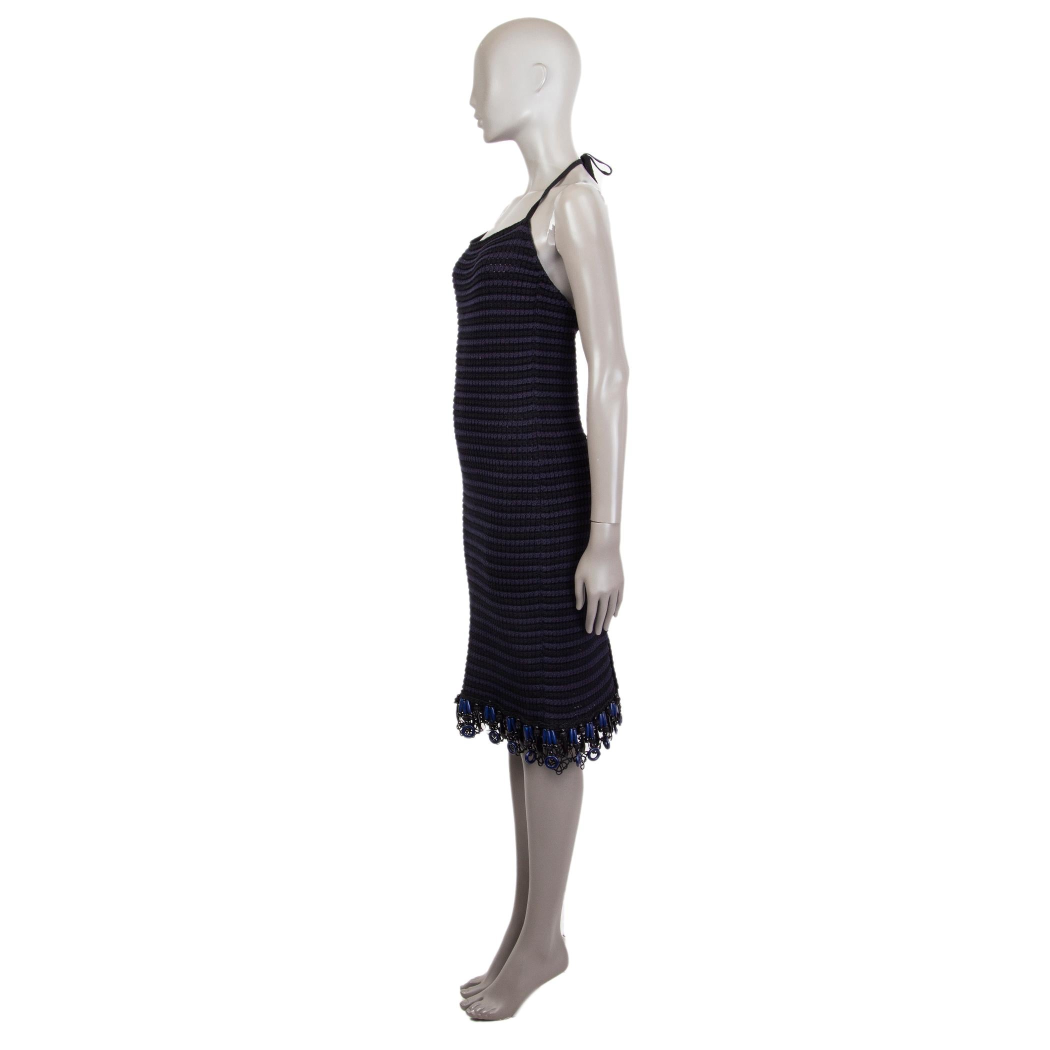 Prada crochet dress in midnight blue and black cotton (100%) with a neck holder, straight fit and laced hemline detailed with ornaments. Fabric comes in a knitted look. Unlined. Has been worn and is in excellent condition.

Tag Size 40
Size S
Bust