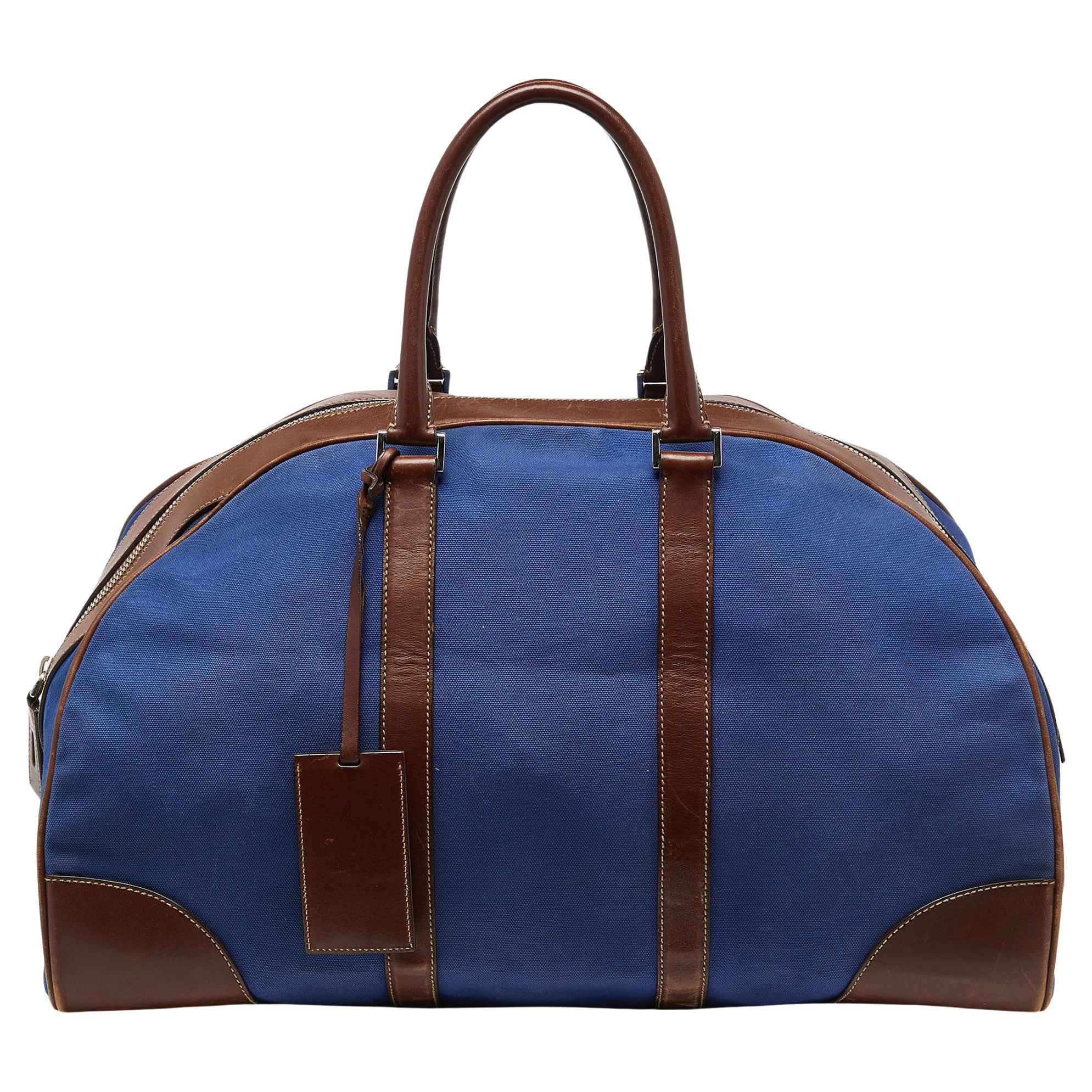 Prada Blau/Braune Weekender-Tasche aus Segeltuch und Leder