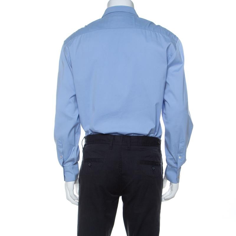 A shirt like this one from Prada is just what you need in your wardrobe this season. Tailored from a cotton blend, it has long cuff sleeves and front buttons. The blue shirt brings the right mix of style and comfort.

Includes: The Luxury Closet