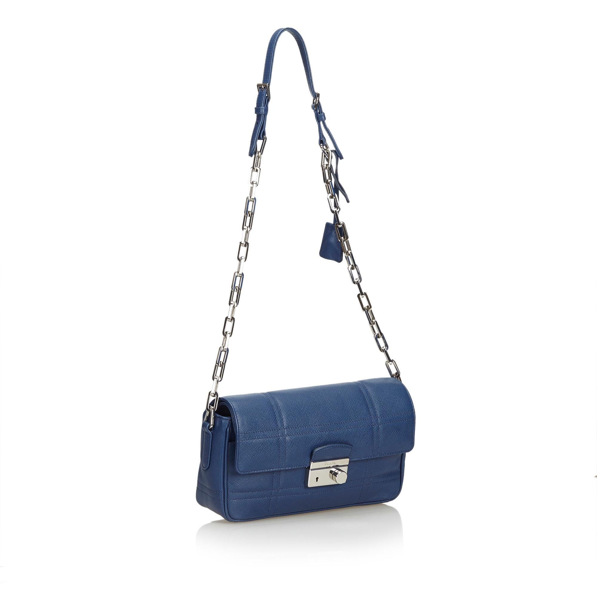 This shoulder features a leather body, a silver-tone chain strap, a front flap with push lock closure, and an interior zip pocket. It carries as AB condition rating.

Inclusions: 
Authenticity Card

Dimensions:
Length: 16.00 cm
Width: 22.00