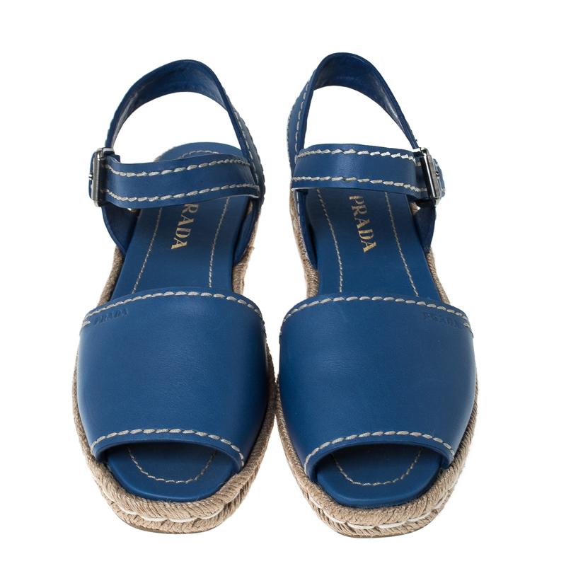 Step out in style this summer with these espadrilles from Prada. They feature a blue-colored leather exterior, peep-toes, ankle straps and braided platform with leather-lined insoles. Soak up the sun by slipping these on with shorts and