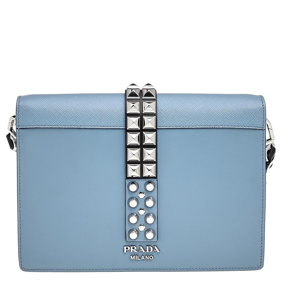 Crafted using leather, this creation in blue is designed to easily hold all your essentials. The Elektra shoulder bag by Prada features a trim of studs along the middle of the bag and a nylon interior. It has a studded shoulder strap,

Includes: