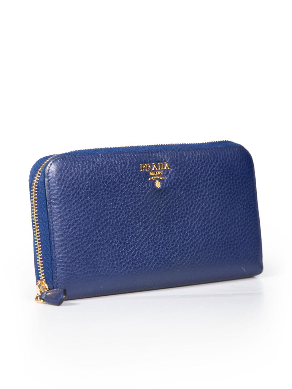 CONDITION is Very good. Minimal wear to wallet is evident. Minimal abrasion and scratches to the leather and discolouration on the zipped compartment lining on this used Prada designer resale item. Comes with original box.
 
 
 
 Details
 
 
 Blue
