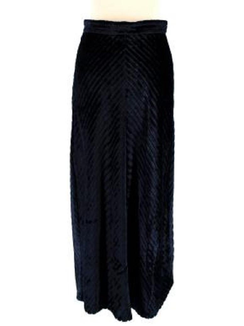 Prada Deep Blue Velvet Chevron Maxi Skirt

- Soft velvet chevrons in deep navy blue 
- Straight maxi skirt with flowy silhouette 
- Silk lined 
- Waistband with hidden zip down one side 
- Seam down the centre 

Made in Italy
90% viscose, 10%