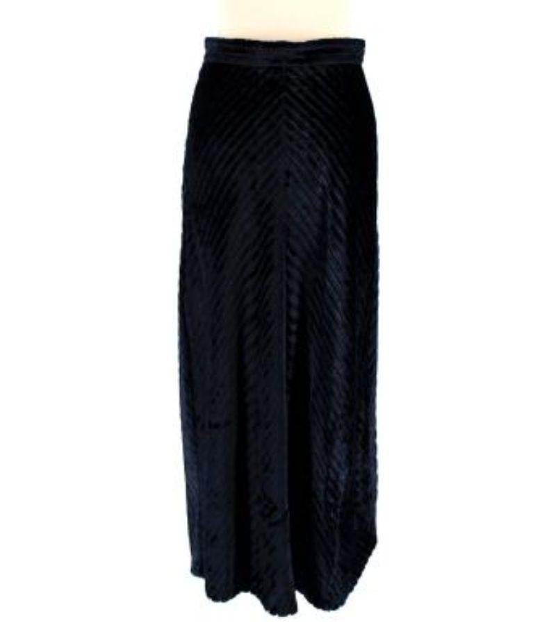 Prada Deep Blue Velvet Chevron Maxi Skirt

- Soft velvet chevrons in deep navy blue 
- Straight maxi skirt with flowy silhouette 
- Silk lined 
- Waistband with hidden zip down one side 
- Seam down the centre 

Made in Italy
90% viscose, 10%