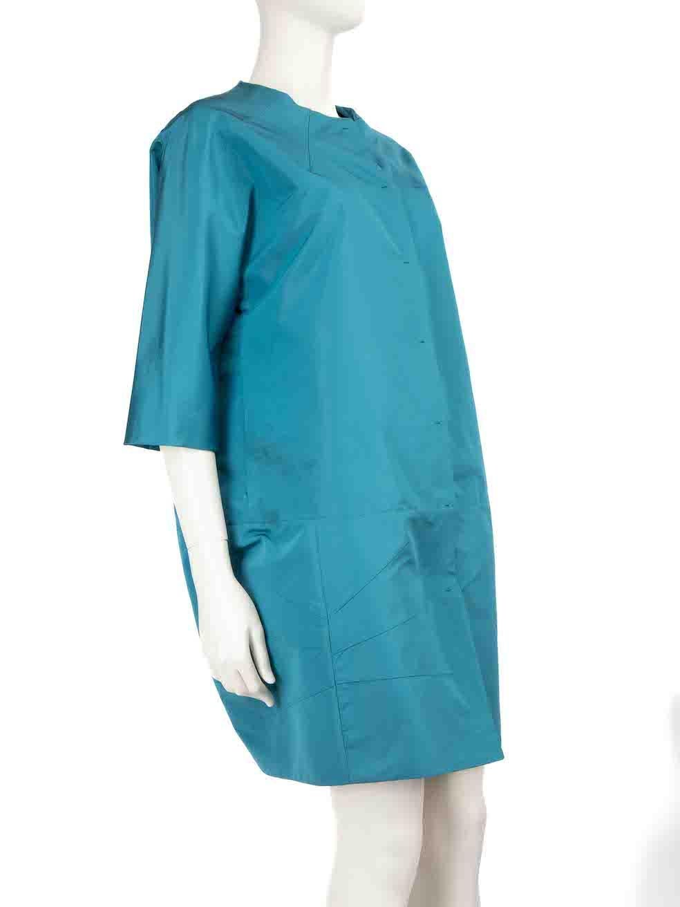 CONDITION is Good. Minor wear to coat is evident. Light discolouration to the front right side, internal rear neckline and the centre back on this used Prada designer resale item.
 
 
 
 Details
 
 
 Blue
 
 Silk
 
 Coat
 
 Long sleeves
 
 Round