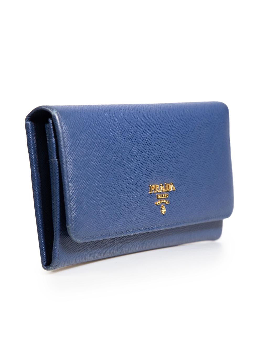 CONDITION is Very good. Minimal wear to wallet is evident. Minimal wear to corners with abrasions and light discolouration mark on the inside of the zipped compartment at the back on this used Prada designer resale item. The item comes with its
