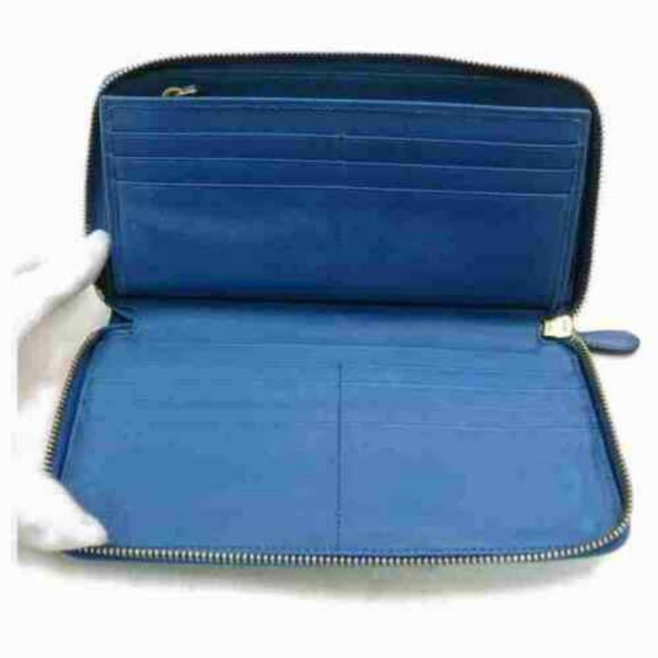 Prada Cartera larga de piel saffiano azul con cremallera Zippy Continental 860192 Azul