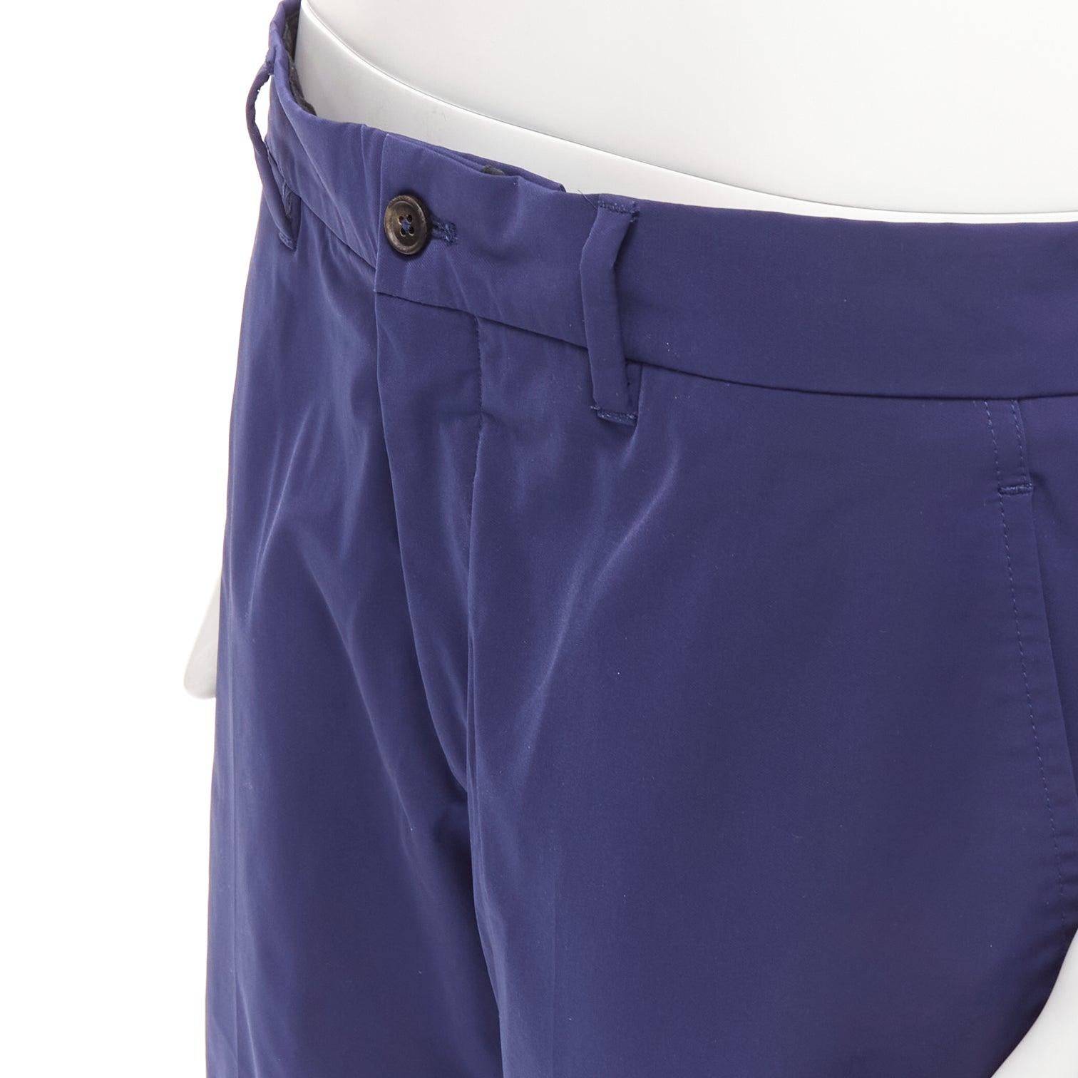 PRADA blue shiny nylon back darts button pocketed Bermuda shorts IT50 L
Reference: JSLE/A00140
Brand: Prada
Designer: Miuccia Prada
Material: Nylon
Color: Blue
Pattern: Solid
Closure: Zip Fly
Lining: Black Fabric
Extra Details: Button detail at back