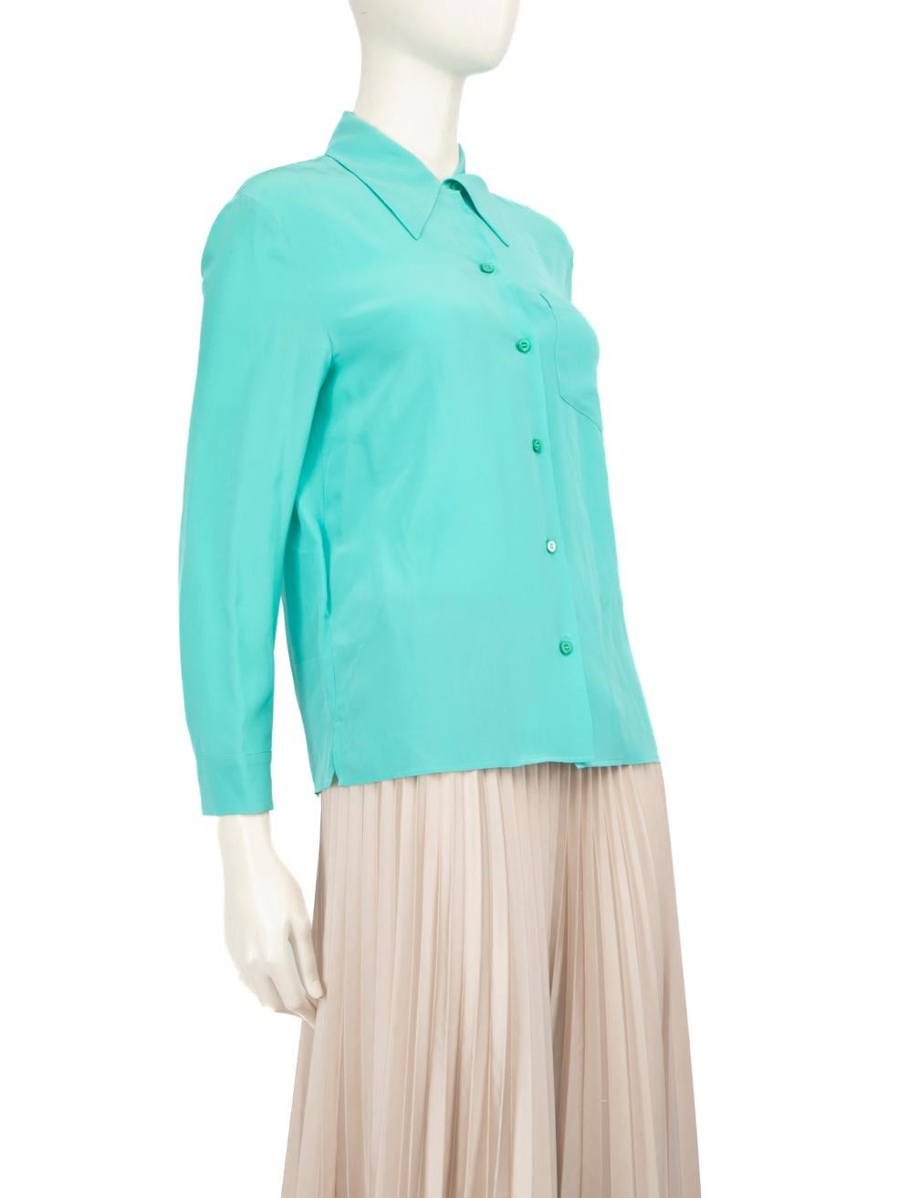 CONDITION is Very good. Hardly any visible wear to shirt is evident on this used Prada designer resale item.
 
 
 
 Details
 
 
 Blue
 
 Silk
 
 Shirt
 
 Long sleeves
 
 Buttoned cuffs
 
 Button up fastening
 
 1x Front pocket
 
 
 
 
 
 Made in