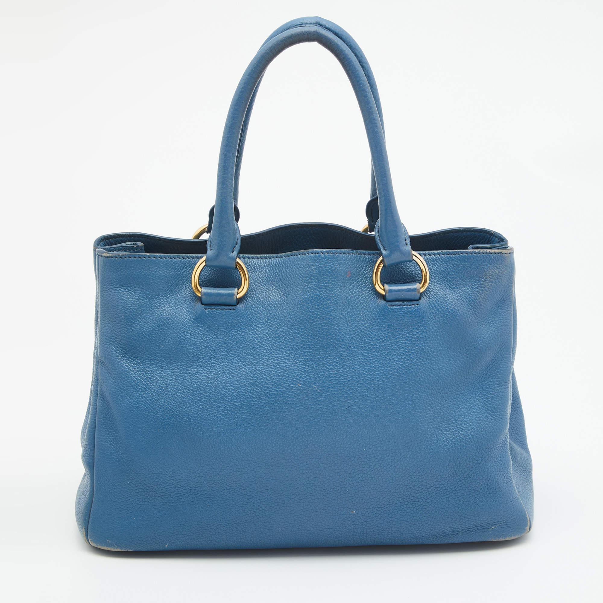 This tote is a result of blending high crafting skills with a practical design. It arrives with a durable exterior complemented by luxe detailing. It is an accessory that you can count on.

Includes: Detachable Strap