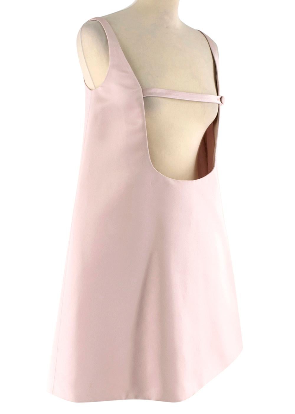 Prada blush silk trapeze pinafore dress. RRP £1855.00

Can be worn either side
Fully Lined
As seen on the runway. Made in Italy. Featuring a hidden zip and hook fastening and one button detail at the back. 

Please note, these items are pre-owned