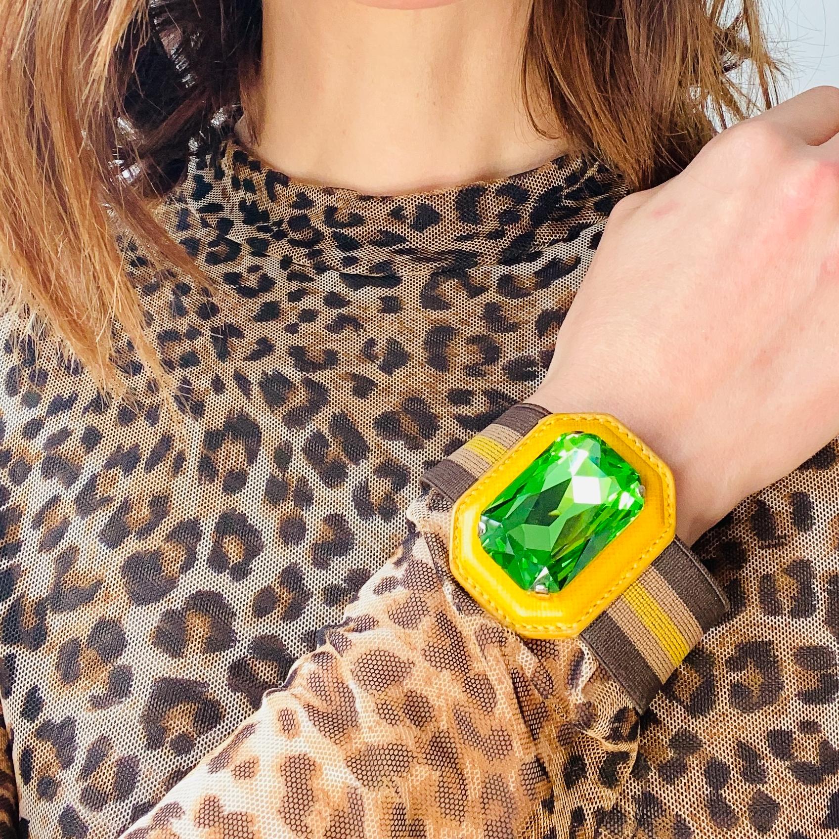 Prada Vintage Y2K Bracelet

Super cool statement cuff bracelet from Prada

Detail
-Made in Italy in the 2000s
-Huge vibrant green stone set within yellow saffiano leather
-Complete with box
-Adjustable wristband

Size & Fit
-Approx length 7 inches /