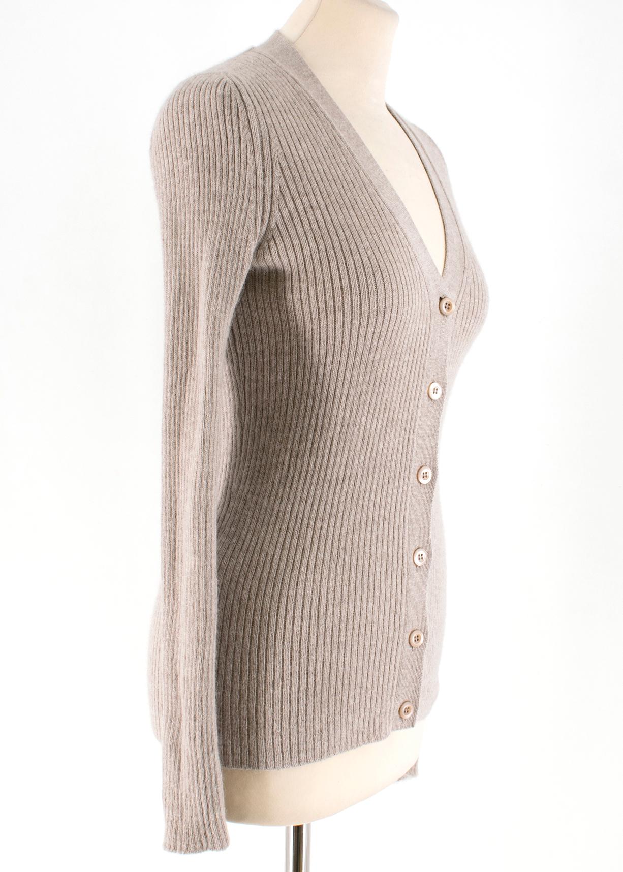 Prada Brown Alpaca Lined V-neck Cardigan

- Brown, alpaca
- Line seamed
- Single breasted buttoned closure
- V-neck
- Long sleeves

Please note, these items are pre-owned and may show some signs of storage, even when unworn and unused. This is
