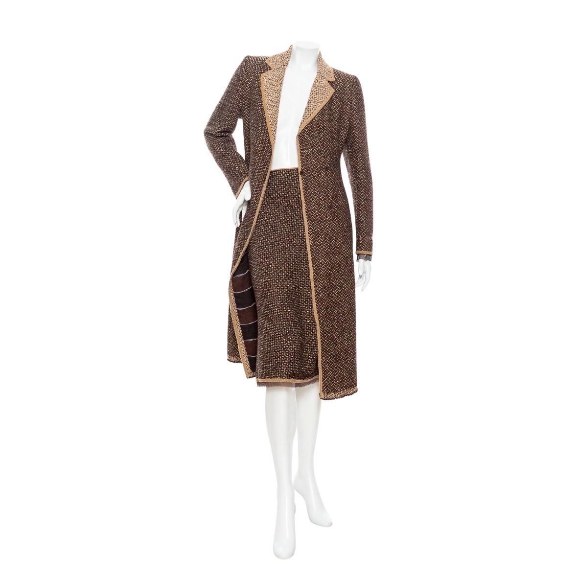 Prada Brown and Tan Virgin Wool Coat and Skirt Two-Piece Set

Matching pumps (size 38) in separate listing 

Two-piece set included coat and skirt
Brown/Tan/Black/White
Woven tweed patterning
Coat
Double breasted
Notched collar
Striped lining and